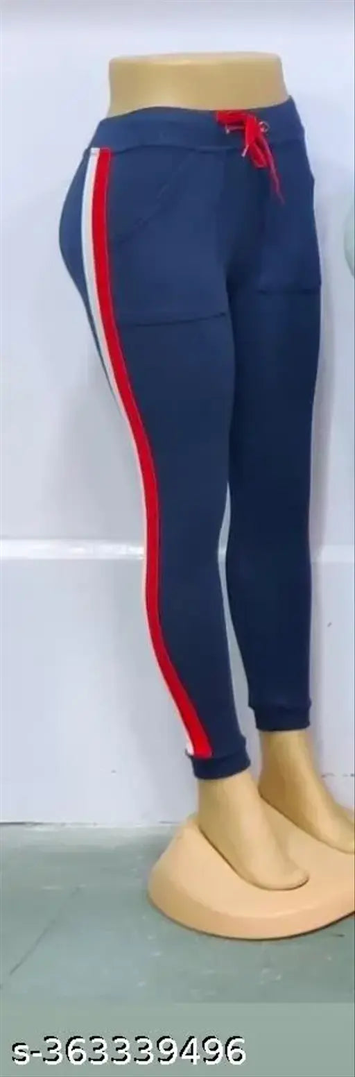 Striped net Lycra ladies pocket jogger pant for sports, gym, and casual use. Free size, hip size 28-34 inch, length 37 inch. Made in India