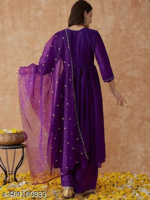 Purple vichitra silk A-Line kurta set with palazzos & dupatta, embroidered, calf-length with side slits. Traditional Indian fashion for women's events and parties