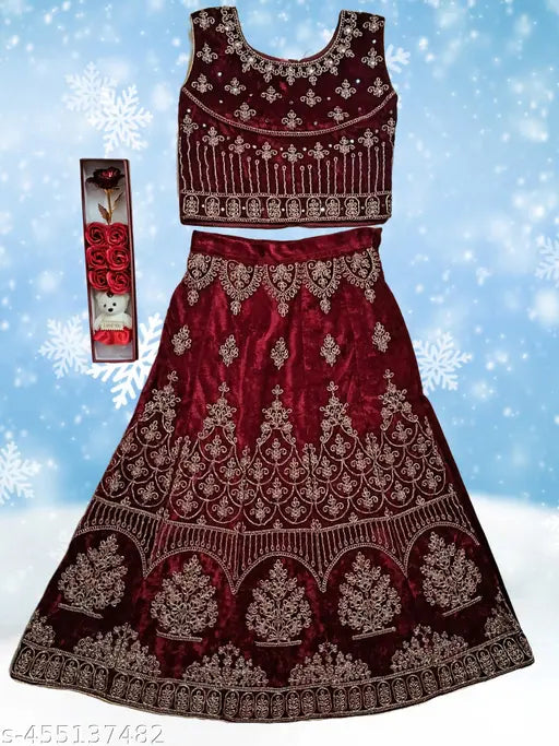 Stylish maroon velvet lehenga-choli set with net dupatta for kids, embroidered design in 5 sizes: 5-6, 6-7, 7-8, 8-9, 10-11, and 13-14 years old. India origin