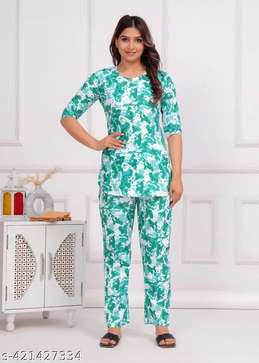 Aqua Green tie-dye viscose rayon night suit set for women, featuring 3/4 sleeve V-neck top and pyjamas. Pack includes two pieces (1 top with 1 pyjama)