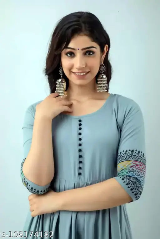 Rayon printed long flared Anarkali Kurti with three-quarter sleeves and round neck, ideal for Indian women's casual or formal wear. Hand block pattern adds elegance