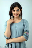 Rayon printed long flared Anarkali Kurti with three-quarter sleeves and round neck, ideal for Indian women's casual or formal wear. Hand block pattern adds elegance