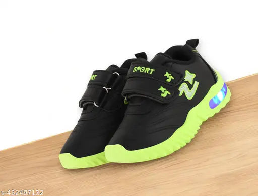 Green and black kids' LED shoes with Velcro straps