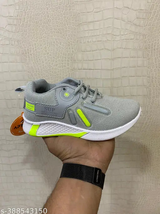Grey and green knit sneaker with non-slip sole for sports activities, suitable for both boys and girls