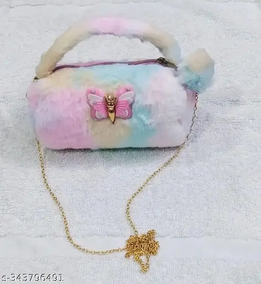 A cute mini fur sling bag, featuring a pouch design, intended for baby girls and kids. It has a stylish design and is adorned with a golden chain