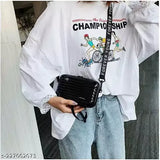Black sling bag with long straps for hands-free carrying