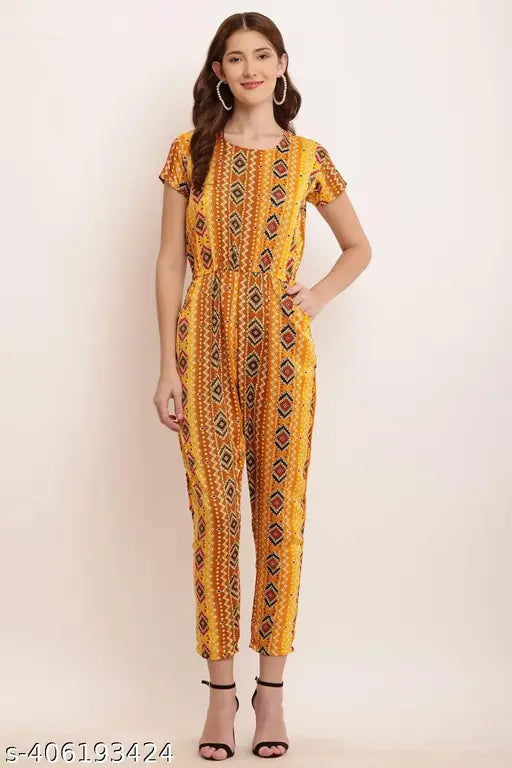 Printed rayon jumpsuit for women and girls, featuring short sleeves, colorful print pattern. Size options: S, M, L. Made in India