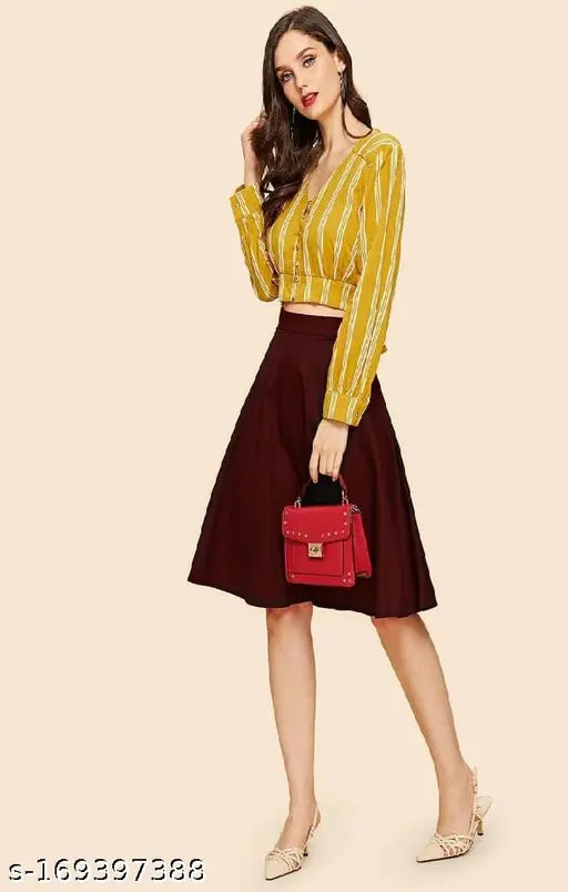 Maroon midi skirt, sleeveless blouse, red purse