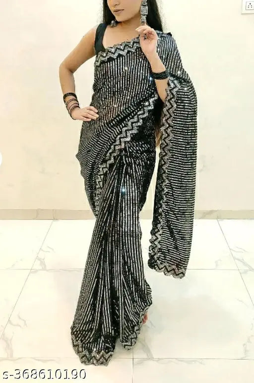 Black and white saree with sheer overlay, embellished border