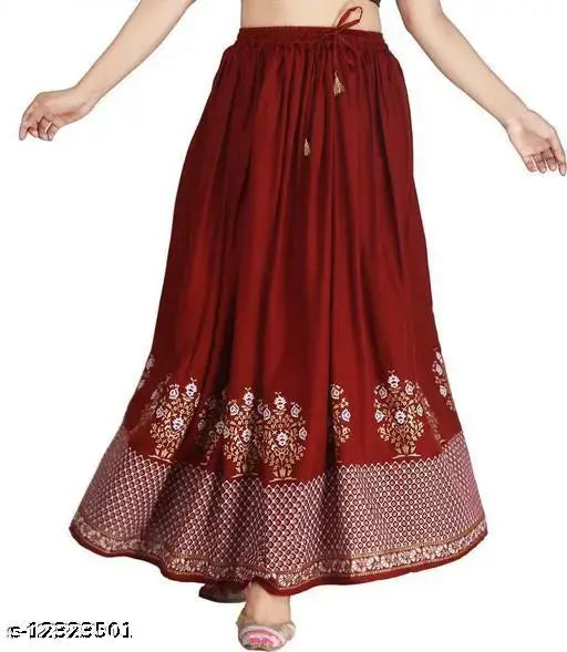 Designer unique women's maroon flared silver rayon skirt with gold and white floral print, elasticated waistband, and tassel detailing