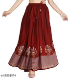 Designer unique women's maroon flared silver rayon skirt with gold and white floral print, elasticated waistband, and tassel detailing