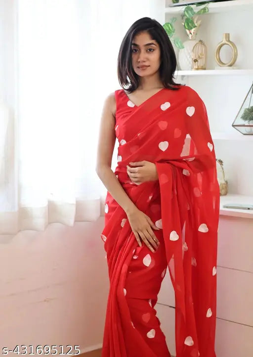 Red georgette saree with polka dot blouse