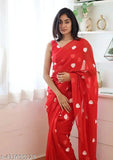 Red georgette saree with polka dot blouse
