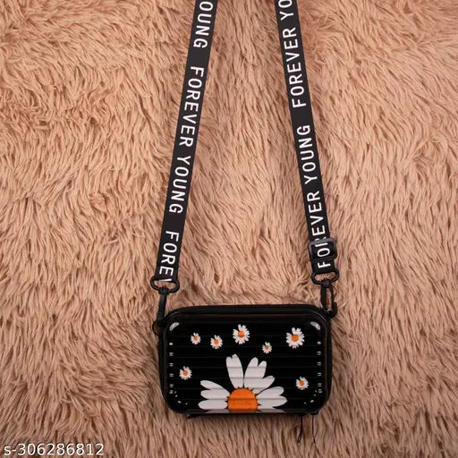 Black sling bag with white flower embroidery, handbag strap