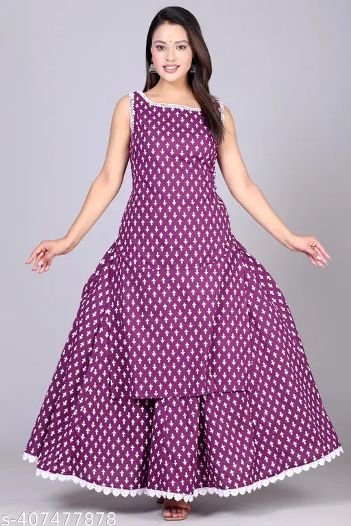 A woman is wearing a purple and white polka dot cotton silk kurti skirt set