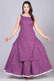 A woman is wearing a purple and white polka dot cotton silk kurti skirt set