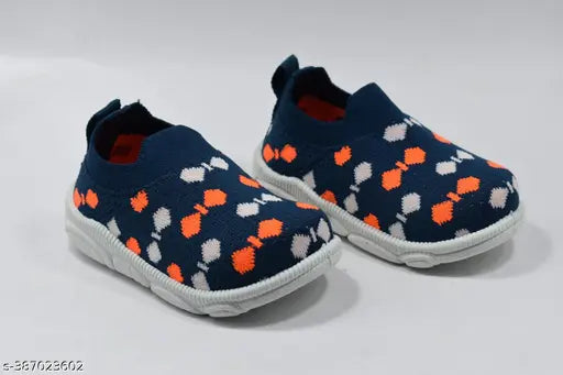 Blue and orange baby shoes with white soles
