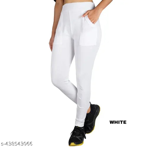 Cotton blend solid color KARARO Women's L Pocket Jeggings - perfect for yoga, workout, or casual wear, mid-waist design with elastic waistband for comfort and support