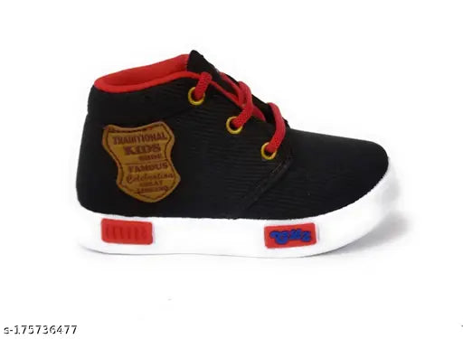 Black and white unisex sneakers with red laces and black sole, suitable for kids ages 14 and up, playful design with a logo on the side
