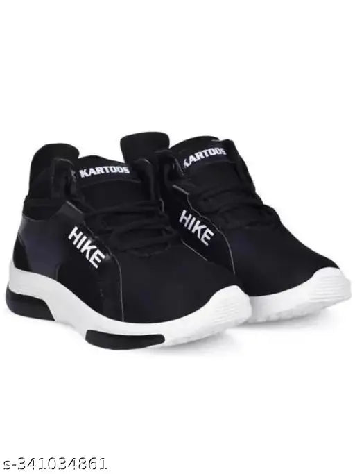 Black and white boys running shoes with Nike swoosh symbol