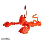 Orange plastic Hanuman idol, flying Lord Hanuman figure, hanging decor for home or car, Indian origin