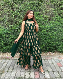 Green rayon fabric sharara kameez with net dupatta, long sleeves, elbow length