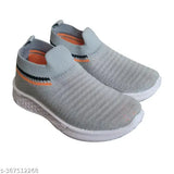 Gray knit sneakers with orange accents, casual style for kids