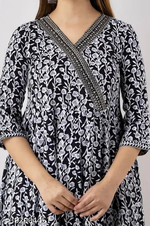 Black premium printed designer Anarkali embroidery rayon kurta with pant and cotton dupatta. Rayon/cotton set featuring three-quarter sleeves, printed pattern, and stitched net detailing. Single size S (36in bust, 14in shoulder, 48in kurta length, 39in bottom length, 2in dupatta length). Available in multiple sizes up to 7XL. Made in India