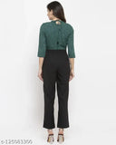 Women's green and black houndstooth print crepe jumpsuit with three-quarter sleeves, depicts a stylish halter neck on a mannequin