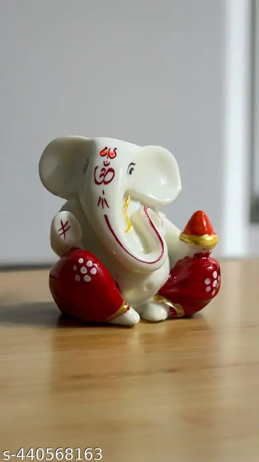 Red Ganesha Statue - Compact 2x2 inch religious idol, ideal for car dashboards, desks, or offices. Symbolic representation of Lord Ganesh. Great Diwali decoration and thoughtful gift choice. Made in India