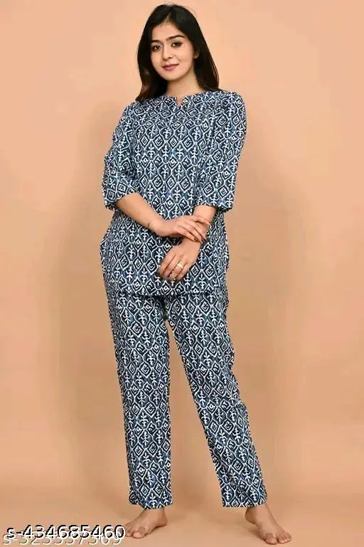Designer printed rayon night suit, three-quarter sleeves, pyjamas set on display stand, India origin