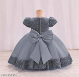 Embellished net jasmine frock with super diamond mono cotton lining, perfect for kids' parties. Sleeve length: sleeveless. Sizes: 12-18 Months to 6-7 Years. Indian origin