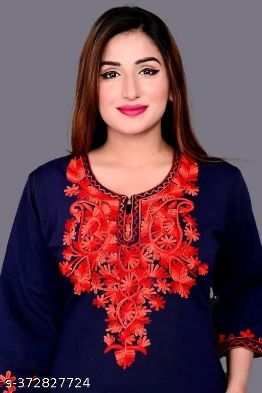 Elegant long-sleeved Aari kurti in navy blue wool, featuring intricate embroidery with floral pattern