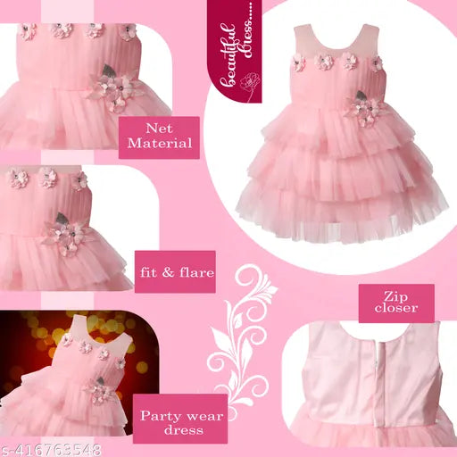 Pink tulle party dress with sleeveless design, knee length, and pink flowers