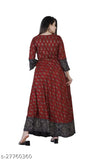 Long, red dress with maroon floral patterns, fitted at waist