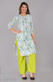 White Rayon Kurta Palazzo set for women - printed net, three-quarter sleeves, classic & trendy ethnic wear from India