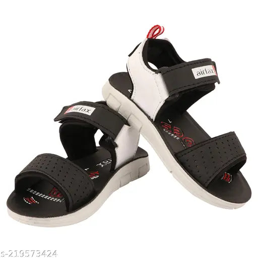 Black PU sandal floater for kids, featuring printed net pattern and adjustable velcro fastening. Perfect for outdoor casual wear. Made with quality materials. Ideal for boys aged 18 months to 5 years. Designed in India