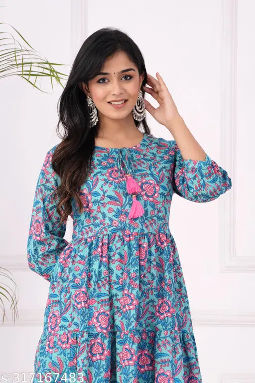 Cotton floral printed Anarkali Kurta, three-quarter sleeves, vibrant Indian fashion on mannequin