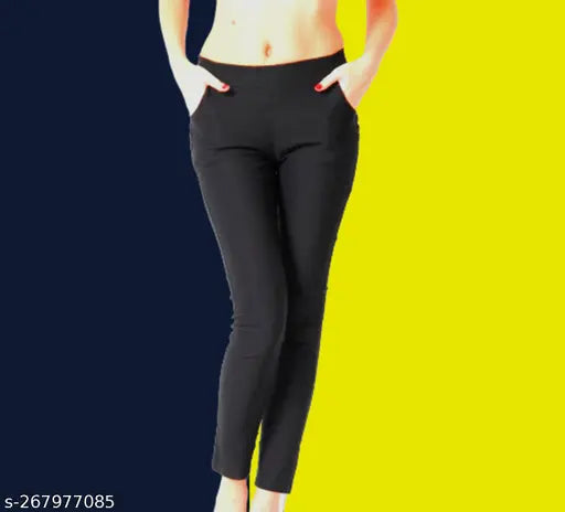 Black lycra slim fit jeggings for women - Soft, stretchy, premium fabric with button design and low rise. Machine washable in cold water. Fits up to size 26 (waist 24-28, length 35in, hip 30in). Origin: India