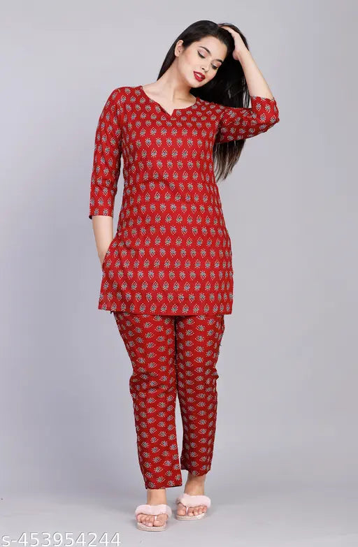 A woman in a red nightsuit