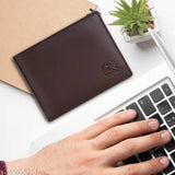 Brown genuine leather RFID wallet with keychain combo set (6 card slots), perfect for men's formal occasions. Rich, supple, and luxurious, this handcrafted wallet offers multiple compartments for organization and a full-length cash compartment. Dry clean only to maintain its quality