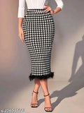 Black and white checkered skirt with ruffled hem