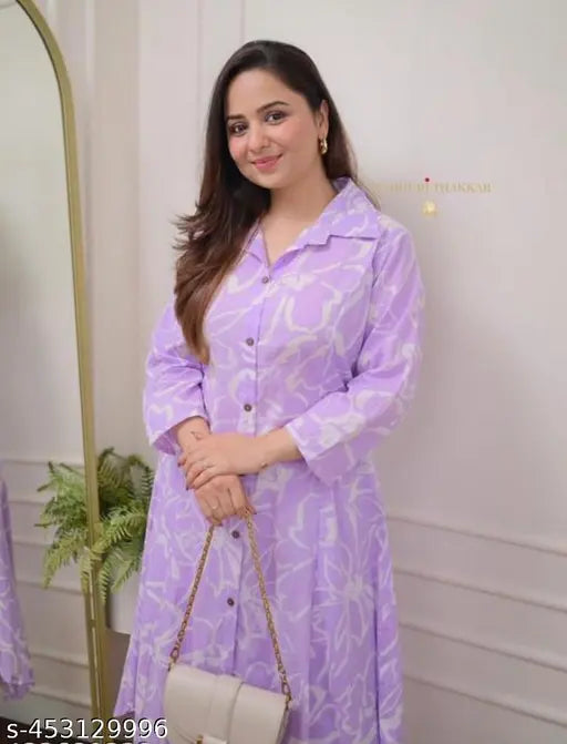 Trendy floral print cotton kurta with palazzos for women, solid net design, three-quarter sleeves