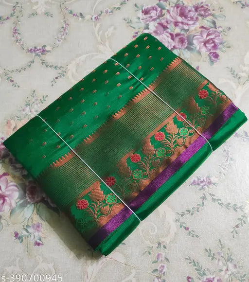 Parrot green Banarsi silk saree with copper zari benteax border, all-over kalajali design. High-quality, elegant bridal wear for women