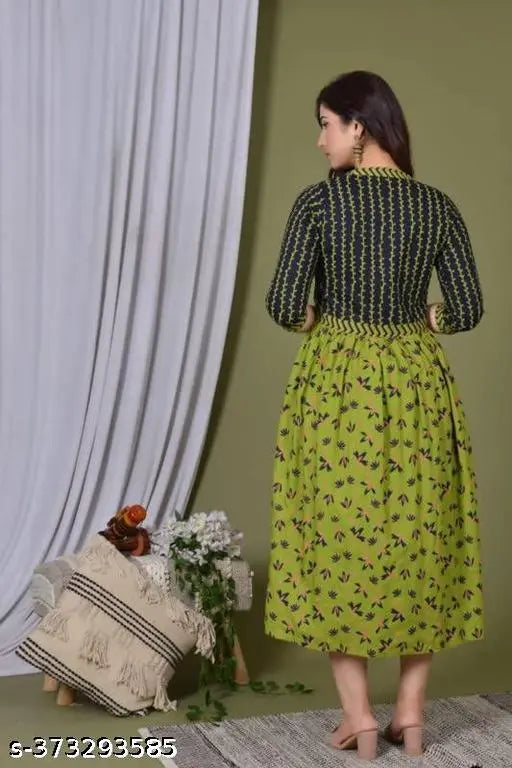 Middi green anarkali kameez with floral print, full-length skirt, long sleeves, embellished detailing
