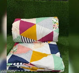Royal blue and white polka dot quilt in double size
