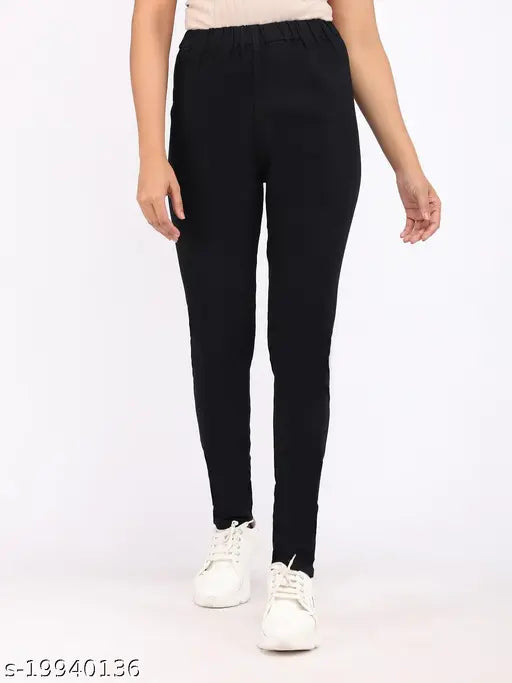 Black denim jeggings for women, stretchable medium waist, solid design, ankle length from AngelFab