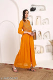 A woman is wearing a mustard yellow georgette anarkali kurta with embroidery