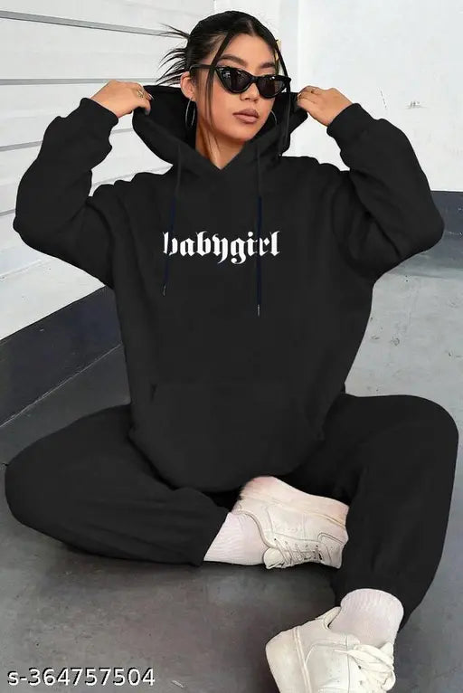 Oversized black cotton-blend hoodie with printed design, long sleeves, size options S to XXL
