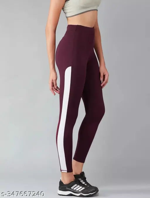 Stretchable striped Lycra jeggings for women's gym wear, black solid tights with interlocking stitching, 28-40 inch sizes available